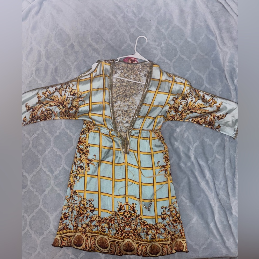 Elegant Blue and Gold Patterned Dress